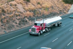 Lawrence, KS - Mack Truck Blowout Causes Injury Crash on I-70